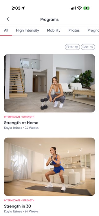 Sweat Programs browser with category tabs for All, High Intensity, Mobility, Pilates, and Pregnancy, with no perimenopause or menopause option